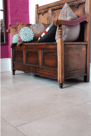 tiled floor with wooden decorative bench