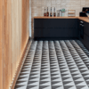 Parisian Cafe Porcelain Tri Black displayed on chic Kitchen floor